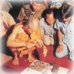 Luang Por Koon Blessing Amulets in Devotional Gathering